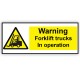 Warning Fork Lift Trucks In Operation 